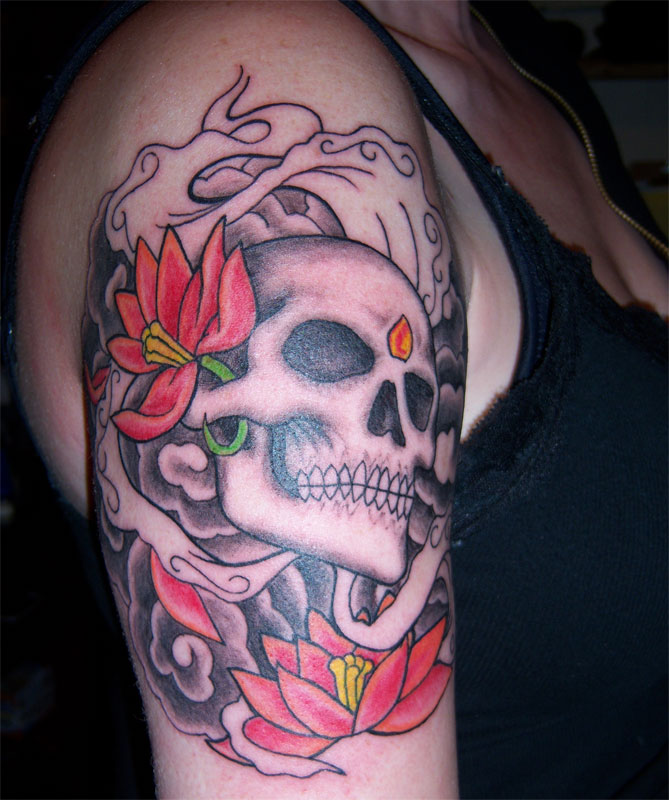 tattoos of skulls and flowers. People” Tattoo Studio is