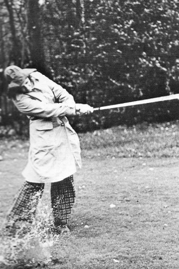 Ignoring the weather, Barb Laskin completes the fourth hole