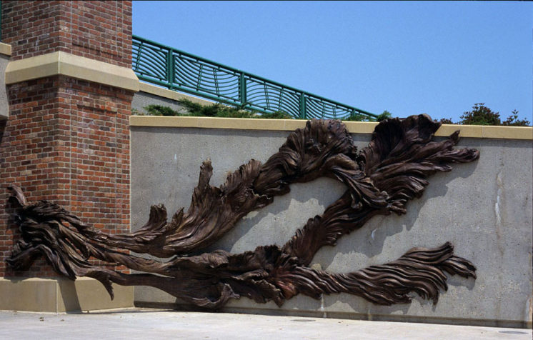 Floodwaters (from 2000) is a large multi-part installation in bronze and stoneware at Harriet Island Plaza in St. Paul, and it addresses the frequent river floods in the neighborhood (the bronze water imagery is set into a gap in the levee that can be closed with stoplogs). The bronze waves were made in collaboration with Jeffrey Kalstrom. 