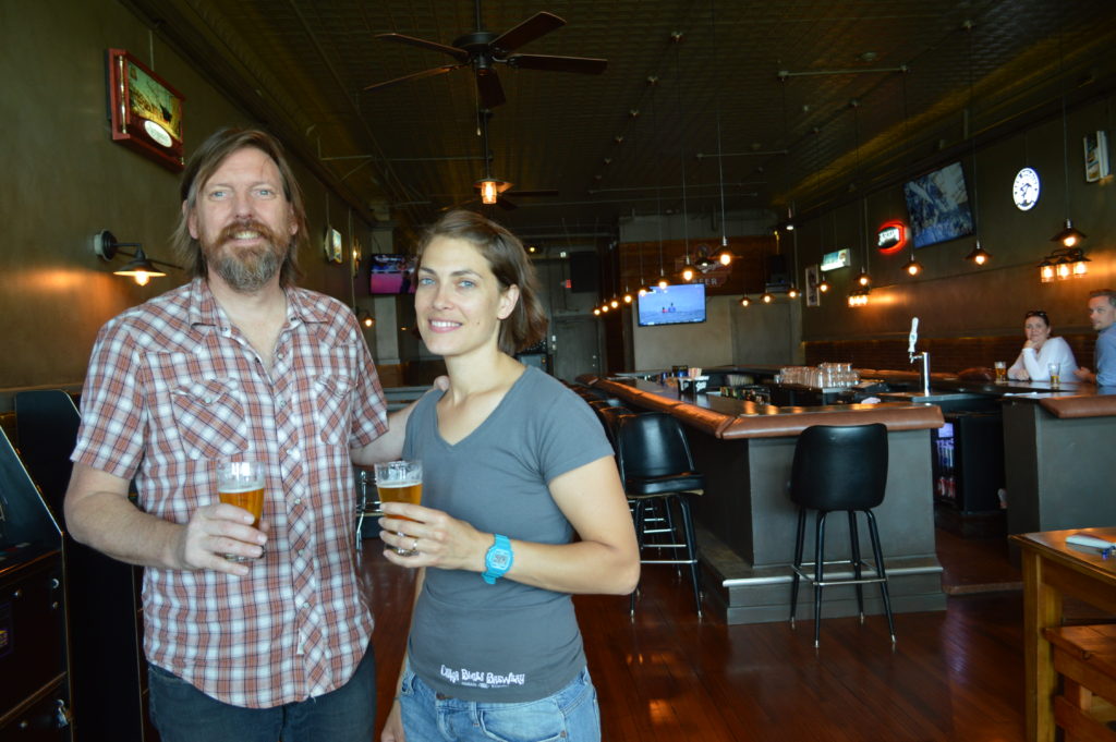 Tim and Naomi Nelson pose inside the Cedar Lounge just off Tower Avenue in Superior.