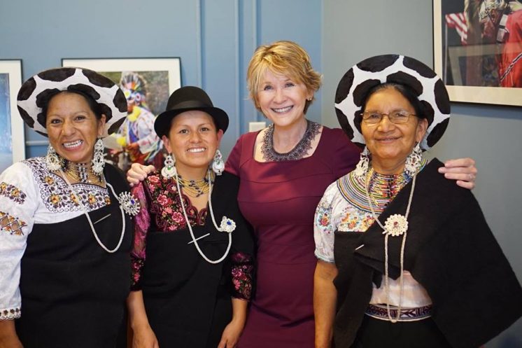 KBJR 6 newscaster and beadwork enthusiast Michelle Lee stands with the visiting artists Victoria Sarango, Paulina Gonzalez and Petrona Guaillas.  