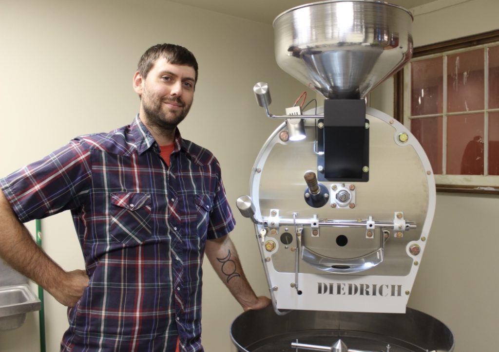 Russell Crawford of Almanac Coffee with his new roaster - Photo by Lissa Maki