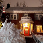 Harry Welty raises the flag with latest snow sculpture