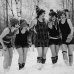 Bathing girls frolic in Chester Park snowdrift