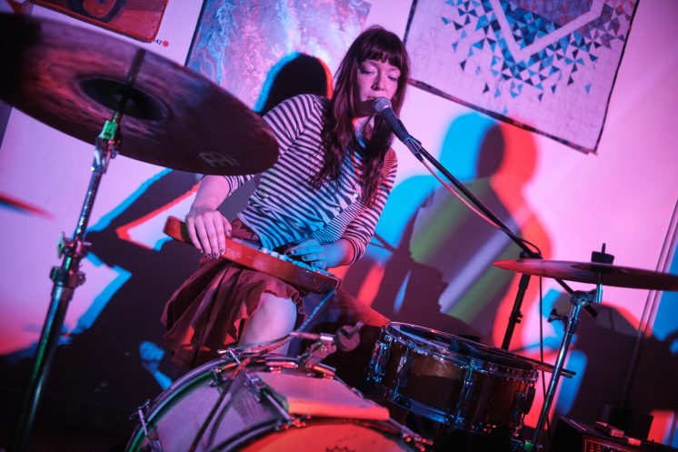 Hollis Sparhawk of Duluth band Willem Dafoe Fan Club singing and playing Omnichord at her drums at Prøve Gallery, Sept. 12, 2026